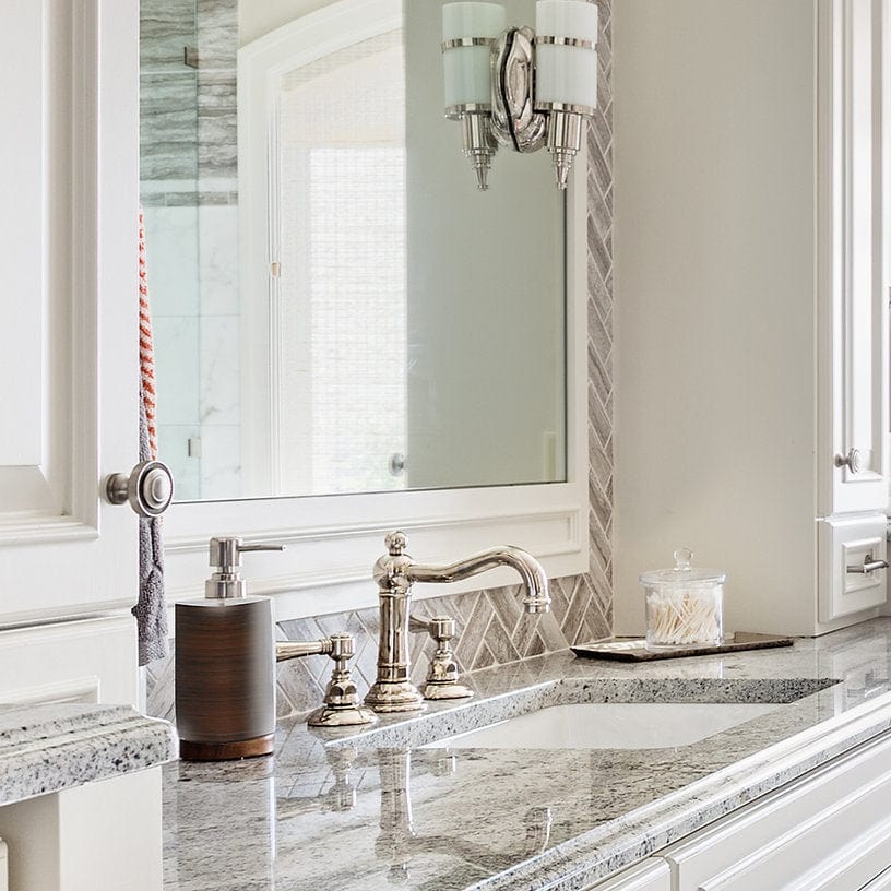 Nantucket 17.125" Undermount Ceramic Bathroom Sink UM-159-W with elegant fixtures and stylish countertop.