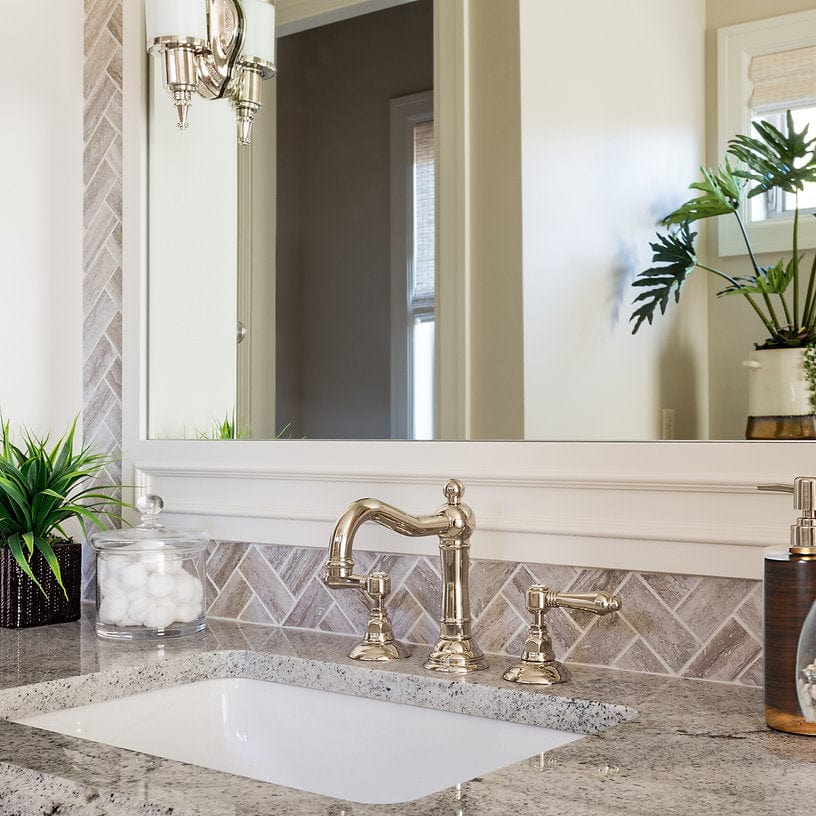 Nantucket 17.125" Undermount Ceramic Bathroom Sink UM-159-W with elegant faucet and stylish mirror backdrop.