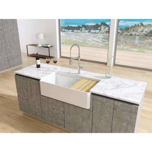 Latoscana 36" Reversible Fireclay Double Bowl 60:40 Farmhouse Sink with Accessory Ledge front view with marble countertop