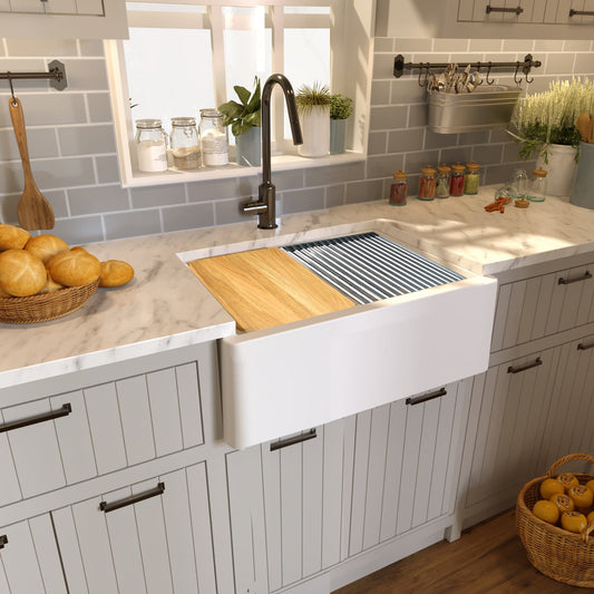 Nantucket 33" Reversible Workstation Granite Composite Apron Sink with Accessory Pack - PR3020-APS-W in a modern kitchen setting.