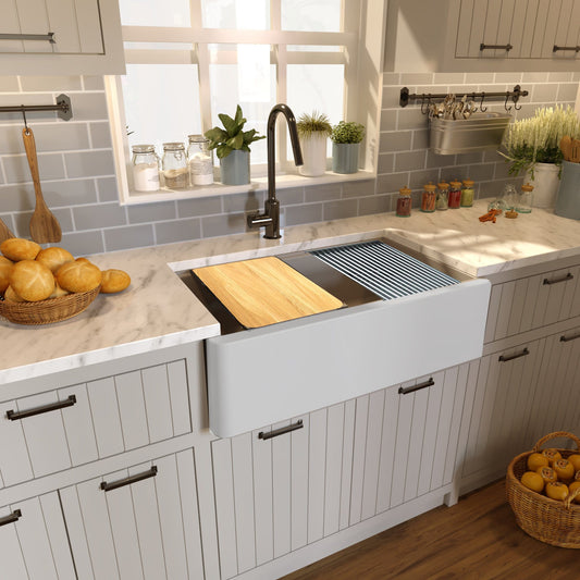Nantucket 33" Reversible Workstation Granite Composite Apron Sink with Accessory Pack - PR3320-APS-G installed in a modern kitchen.