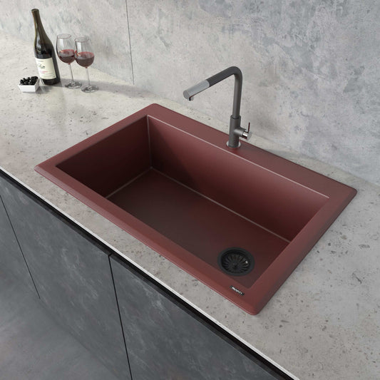 Ruvati epiGranite 33" Topmount Single Bowl Kitchen Sink RVG1033RD in Carnelian Red with modern faucet and stylish countertop.