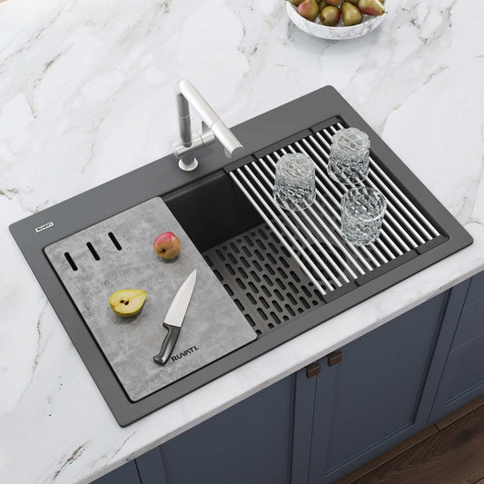 Ruvati epiStage 33" Workstation Drop-in Granite Kitchen Sink RVG1302UG with cutting board and glassware on countertop.