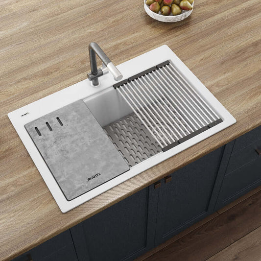 Ruvati epiStage 33" Workstation Drop-in Granite Kitchen Sink RVG1302WH with colander and cutting board on wood countertop.