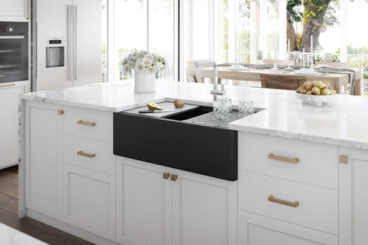 Ruvati epiCast 33" Workstation Composite Granite Kitchen Sink RVG1533BK in modern kitchen with white cabinetry.