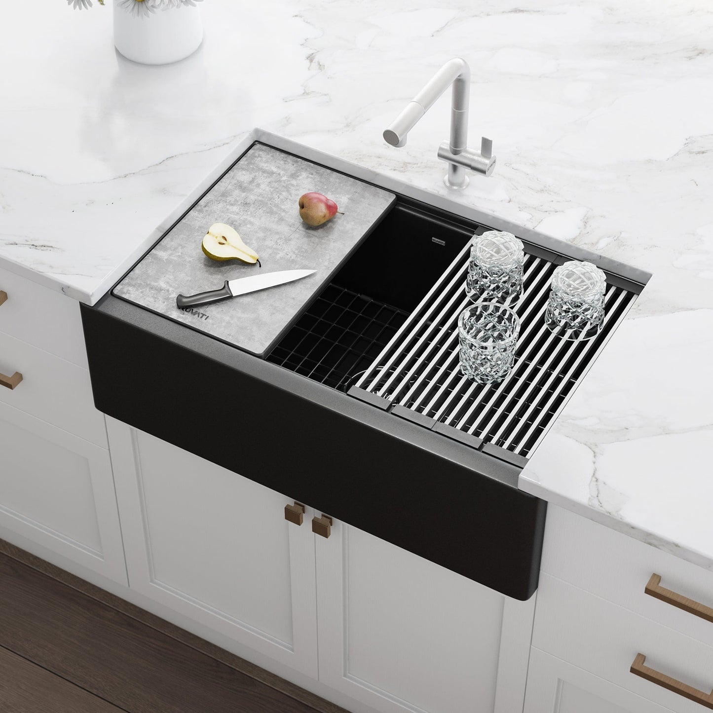 Ruvati epiCast 33" Workstation Composite Granite Kitchen Sink RVG1533BK with cutting board and glasses on countertop.