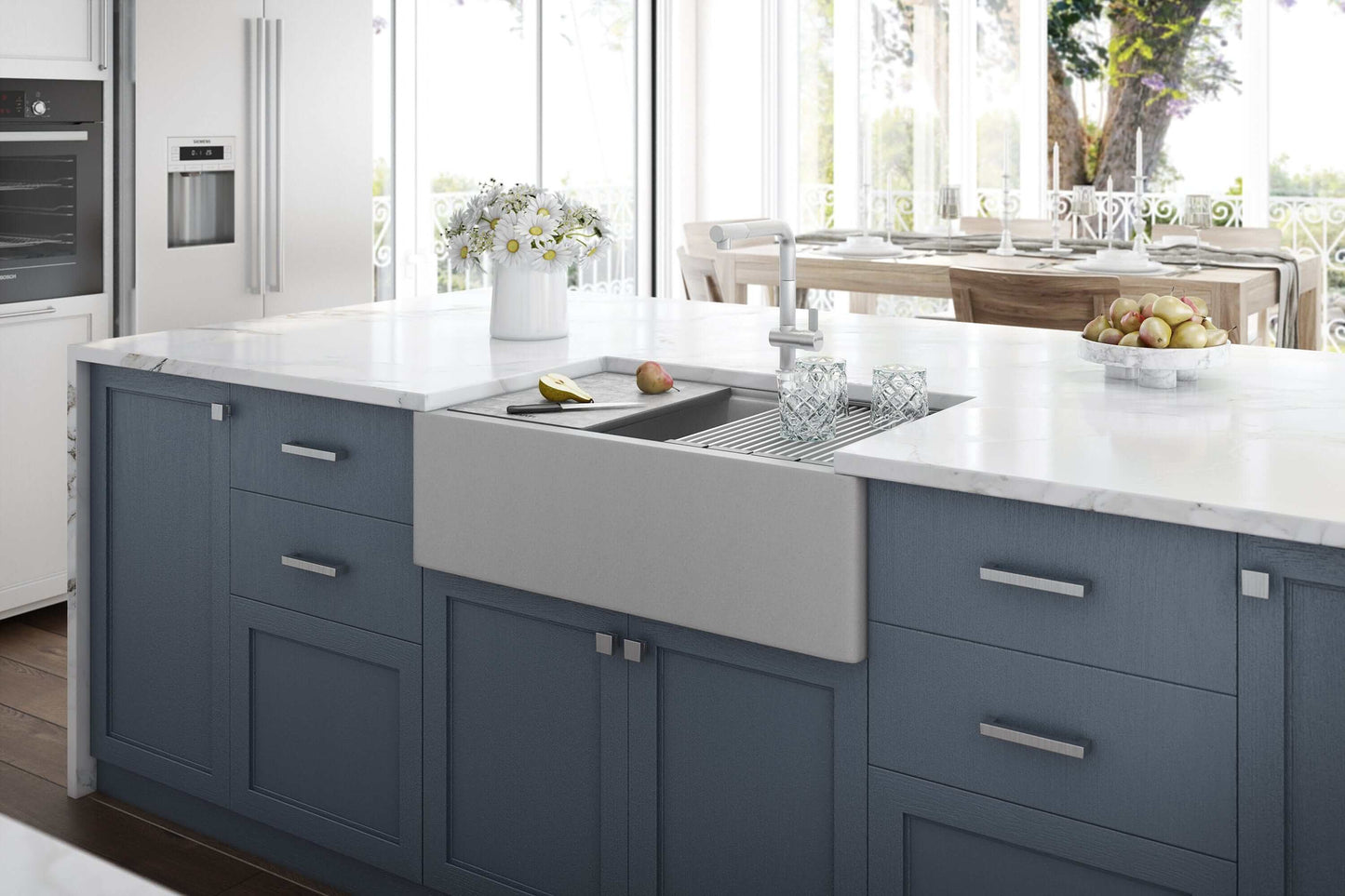 Ruvati epiCast 33" Workstation Composite Granite Kitchen Sink RVG1533GR in a modern kitchen with blue cabinets.