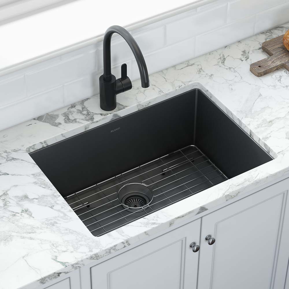 Ruvati Terraza 33" Stainless Steel Kitchen Sink RVH6433BL installed in modern kitchen with marble countertop.