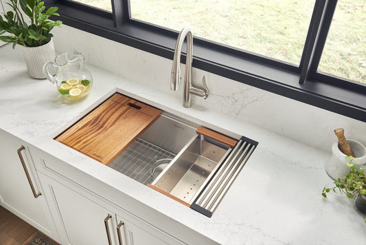 Ruvati Roma Pro 32" Workstation Ledge Stainless Steel Kitchen Sink RVH8301 in a modern kitchen setup with wooden cover.