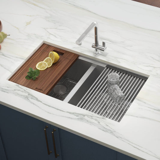Ruvati Roma 33" Workstation Ledge Stainless Steel Kitchen Sink RVH8350 with integrated cutting board and basin.