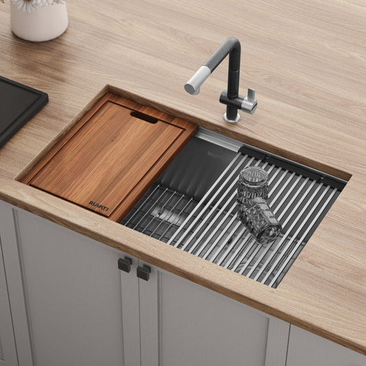 Ruvati Veniso 33" Workstation Slope Bottom Stainless Steel Kitchen Sink RVH8591 with bamboo cutting board and accessories.