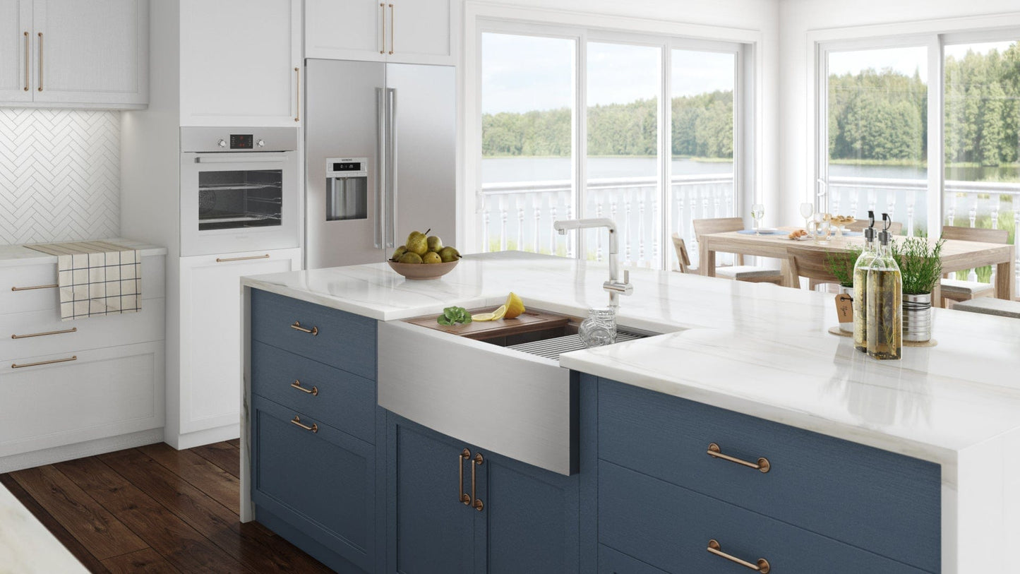 Ruvati Verona 36" Workstation Low-Divide Stainless Steel Kitchen Sink RVH9301 in modern kitchen with blue cabinetry.
