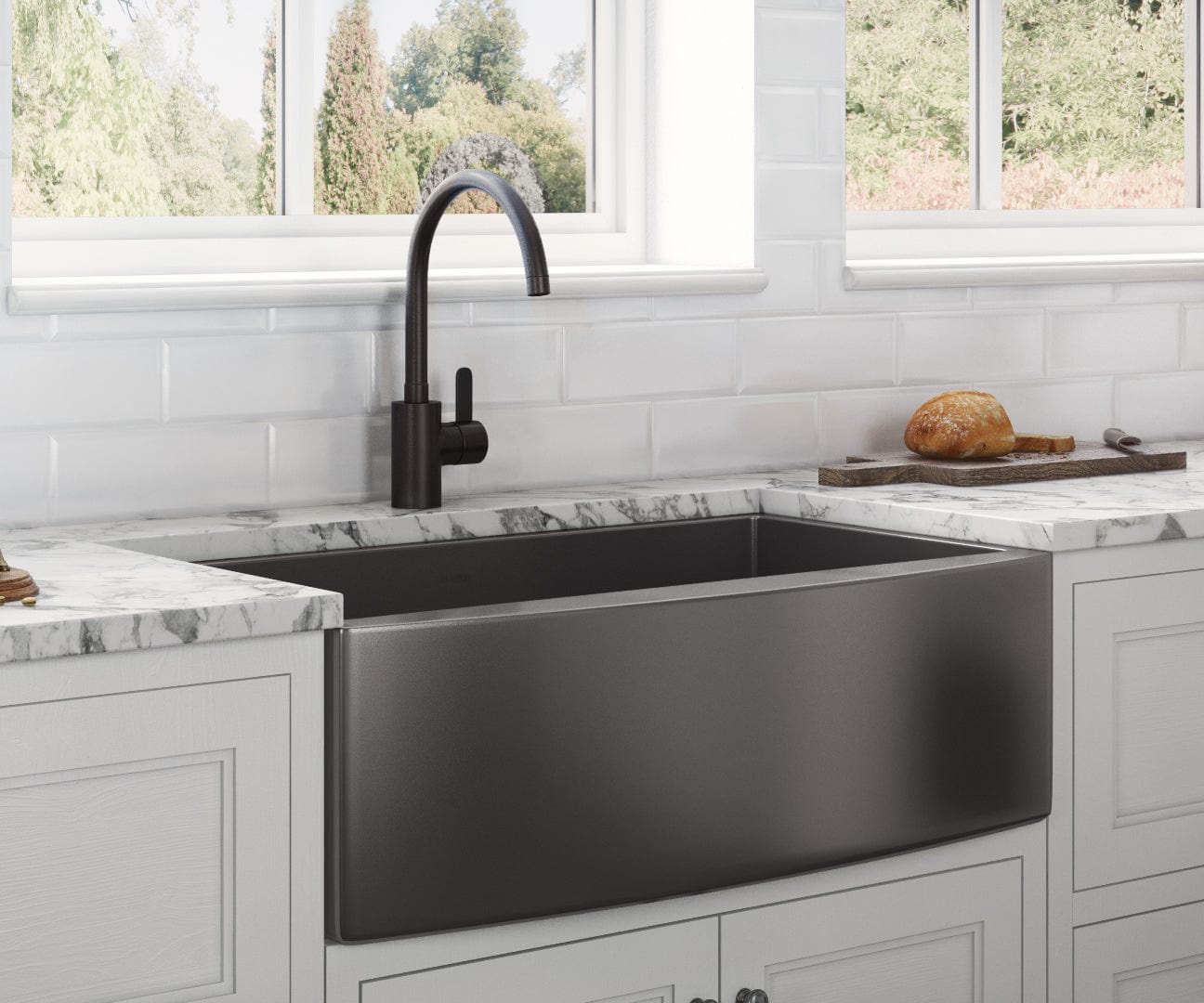 Ruvati Terraza 30" Stainless Steel Kitchen Sink RVH9660BL in a modern kitchen with marble countertop.