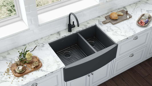 Ruvati Terraza 33" 60/40 Stainless Steel Kitchen Sink RVH9742BL in a modern kitchen with marble countertop.