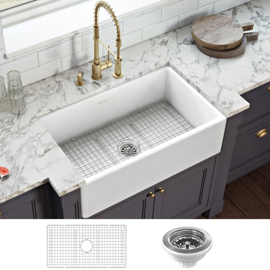 Ruvati Fiamma 33" Fireclay Kitchen Sink RVL2300WH displayed in a modern kitchen with a stylish faucet and marble countertop.