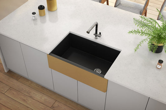 Ruvati Fiamma 30" Modern Single Bowl Fireclay Kitchen Sink RVL4018GRG in matte black and brushed gold on a kitchen countertop.