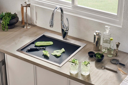 Ruvati Merino 15" Marine Grade Workstation RV Boat Outdoor Sink RVQ5210 with fresh ingredients on countertop.