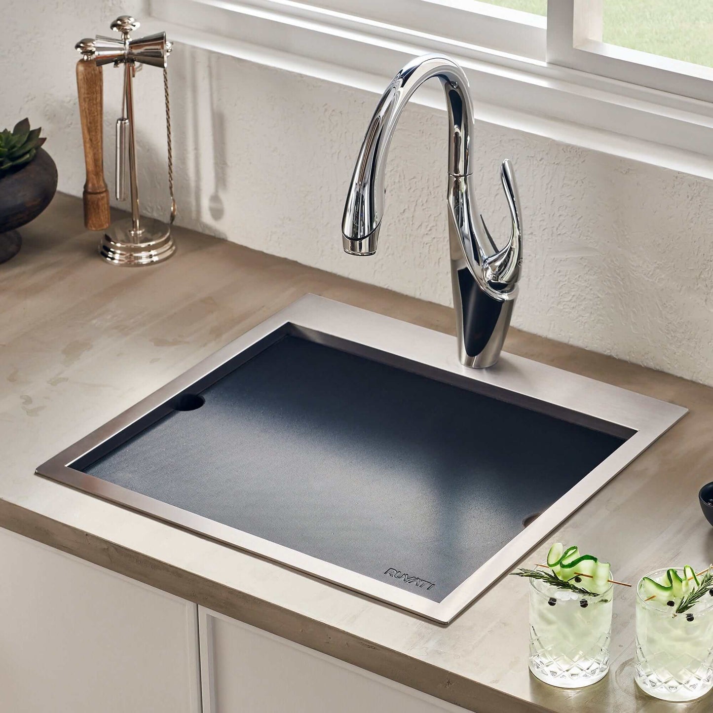 Ruvati Merino 15" Marine Grade Workstation RV Boat Outdoor Sink RVQ5215 installed in a stylish kitchen setup.