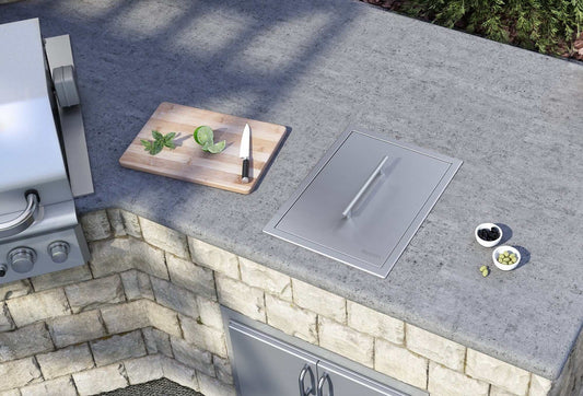Ruvati Insulated Ice Chest Sink 15" BBQ Marine Grade Outdoor Sink RVQ6215 on an outdoor countertop with barbecue tools.