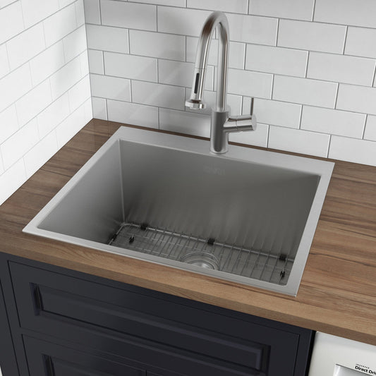 Ruvati Forma 25" Stainless Steel Laundry Utility Sink RVU6015 installed with modern faucet in utility room.