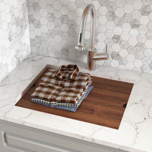 Ruvati Forma 23" Workstation Deep Laundry Utility Sink RVU6320 with neatly folded shirts on wooden cutting board.