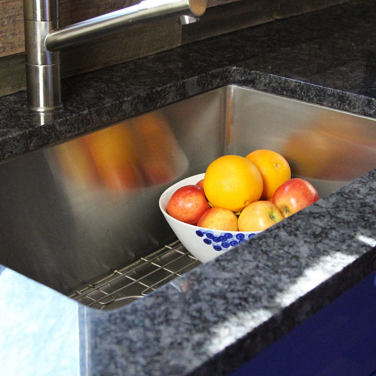 Nantucket 30" Pro Series Undermount Stainless Steel Kitchen Sink SR3018 with a bowl of apples and oranges.