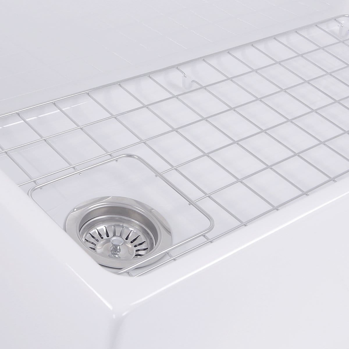 Nantucket 36" Farmhouse Fireclay Sink with Offset Drain and Grid - T-FCFS36 close-up of grid and drain.