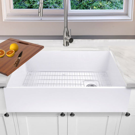 Nantucket 36" Farmhouse Fireclay Sink with Offset Drain and Grid - T-FCFS36 with countertop and cutting board.