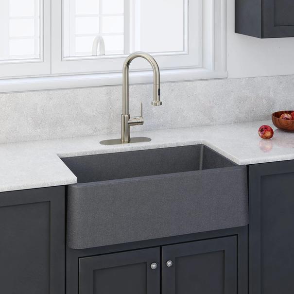 LaToscana Marmorin 33" Farmhouse Kitchen Sink front view featuring modern faucet and elegant countertop.