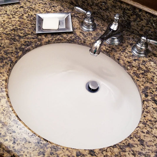 Nantucket 17" Undermount Ceramic Bathroom Sink UM-17x14-W-K featuring elegant oval design and lustrous porcelain finish.
