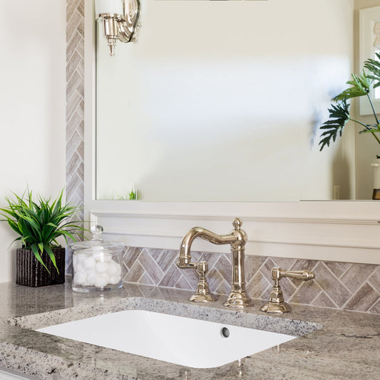 Nantucket 23.5" Undermount Ceramic Vanity Sink UM-2112-W with faucet and countertop details.