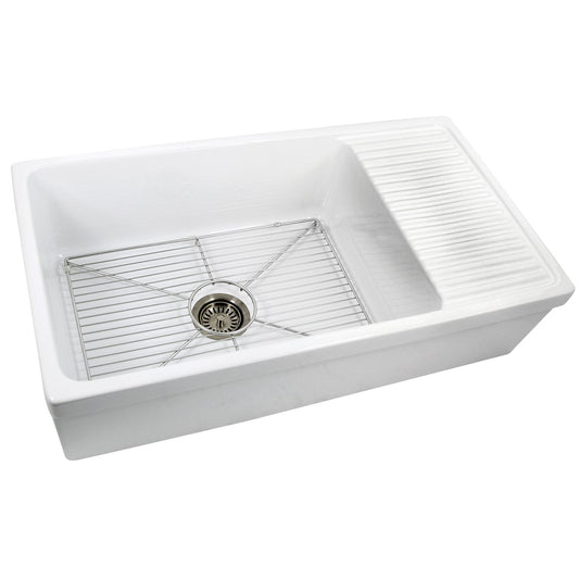 Nantucket Stainless Steel Bottom Grid - BG-FCFS36-DB installed in a white fireclay sink with drainboard.