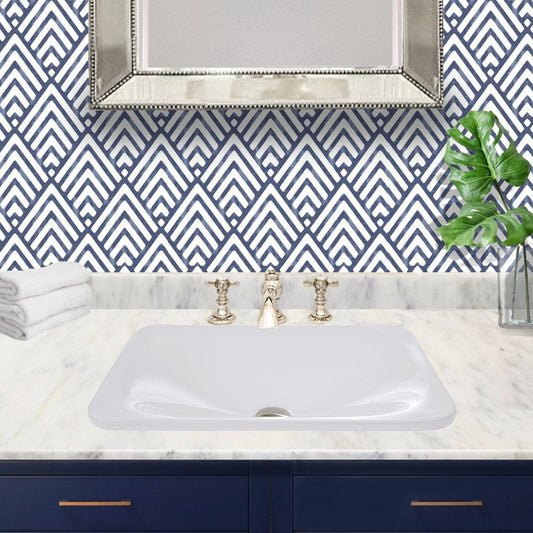 Nantucket 21" Rectangular Drop-In Ceramic Vanity Sink - DI-2114-R beautifully displayed with marble countertop and patterned wall.