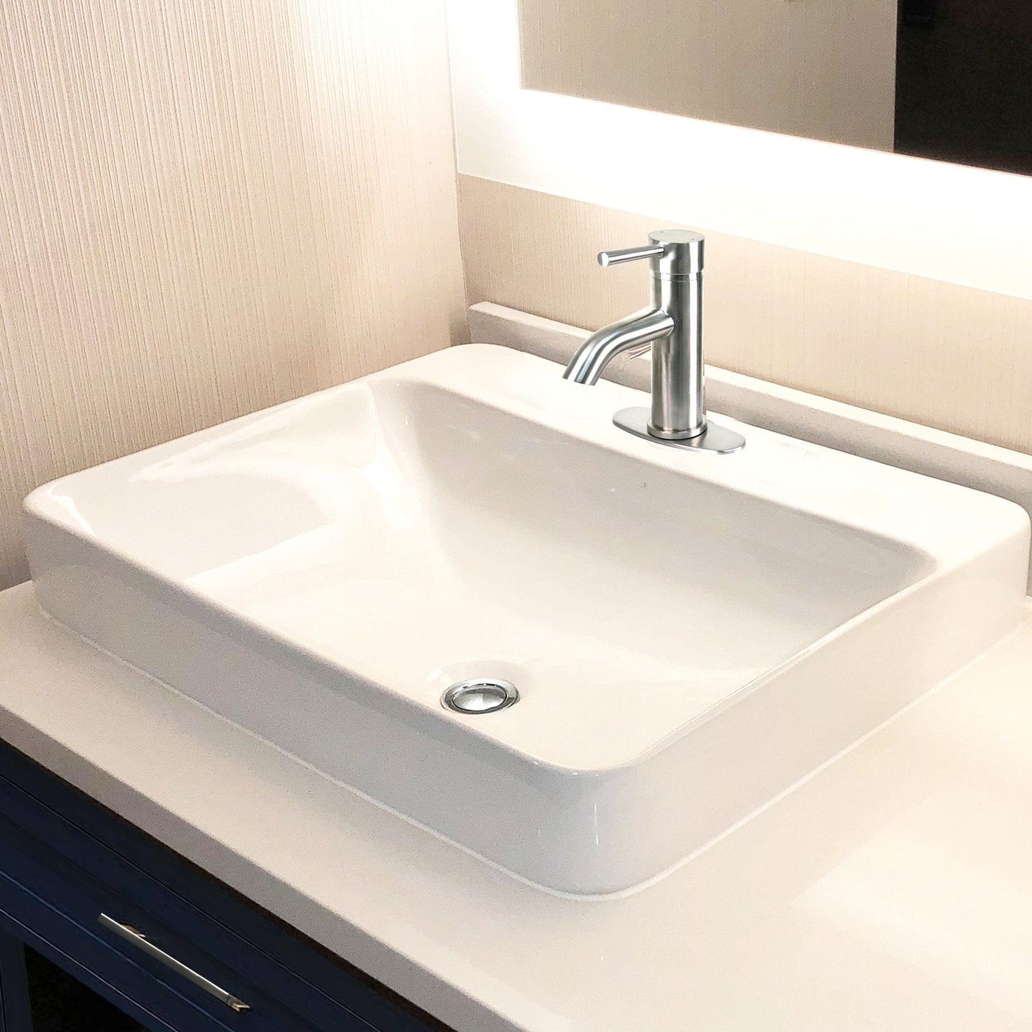 Nantucket 23" 1-hole Rectangular Drop-In Ceramic Vanity Sink - DI-2317-R1 displayed with faucet in modern bathroom setting.