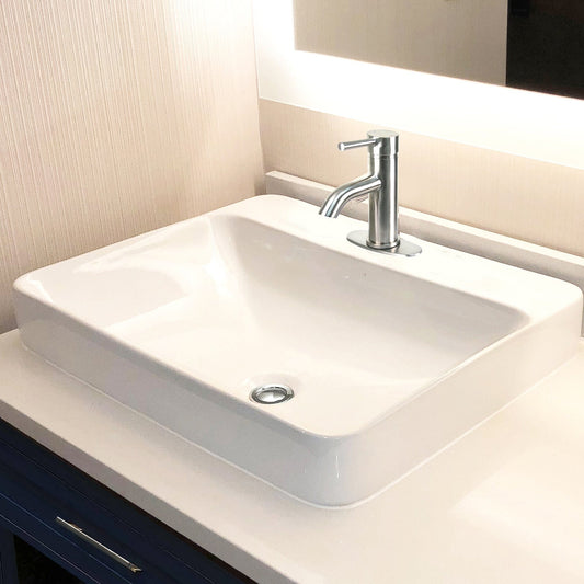 Nantucket 23" 1-hole Rectangular Drop-In Ceramic Vanity Sink - DI-2317-R1 displayed with faucet in modern bathroom setting.