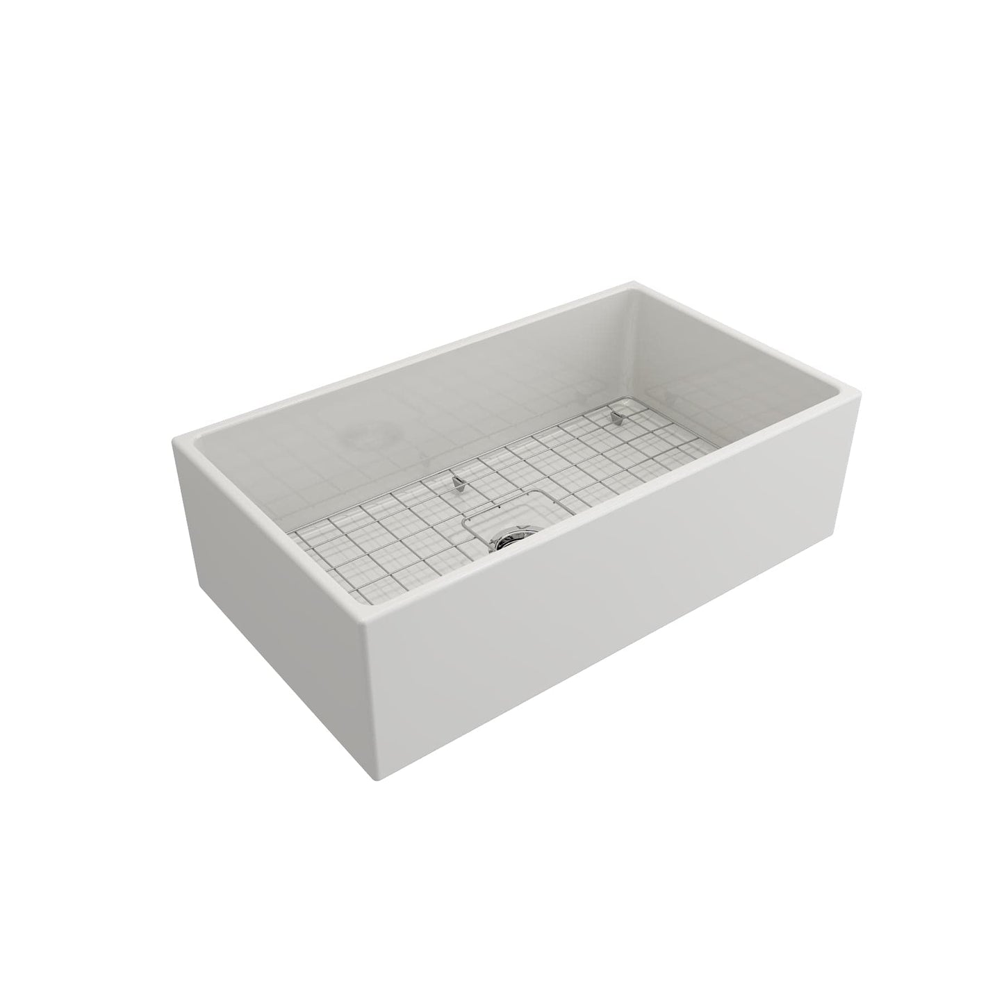 Top corner angle of Bocchi Contempo Fireclay Farmhouse Sink in White showing center drain placement, bottom grid and included sink strainer
