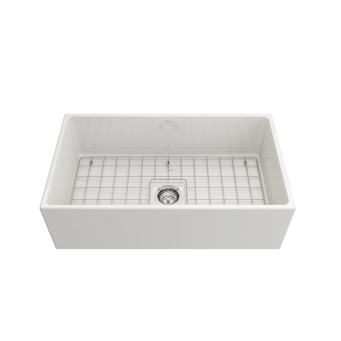Front angle view of Bocchi Contempo 33" Fireclay Farmhouse Sink in White showing included strainer and bottom grid.