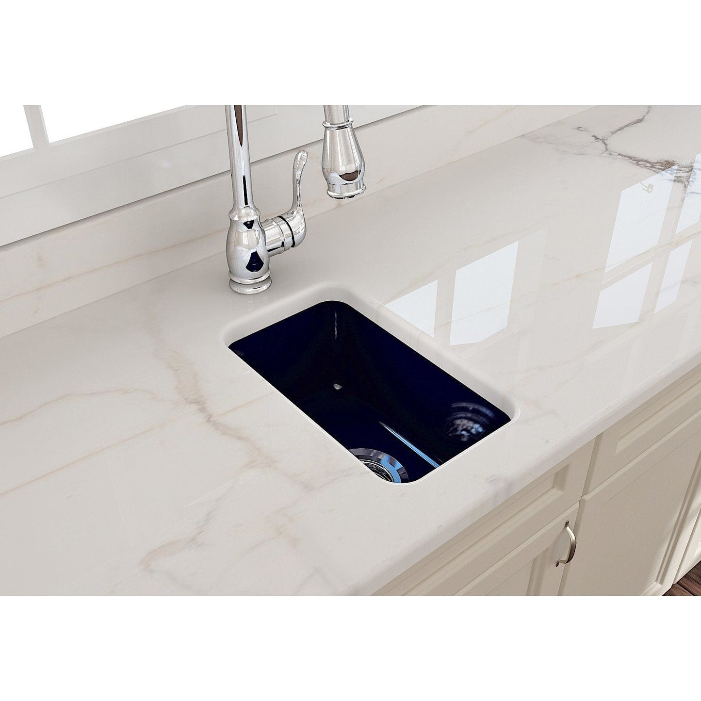 BOCCHI SOTTO 12" Fireclay Modern Undermount Single Bowl Bar Sink with Strainer in navy, top view on white countertop.