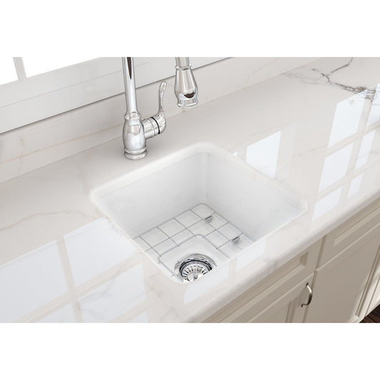 BOCCHI SOTTO 18" Fireclay Modern Undermount Single Bowl Kitchen Sink with Protective Bottom Grid and Strainer top view on marble countertop