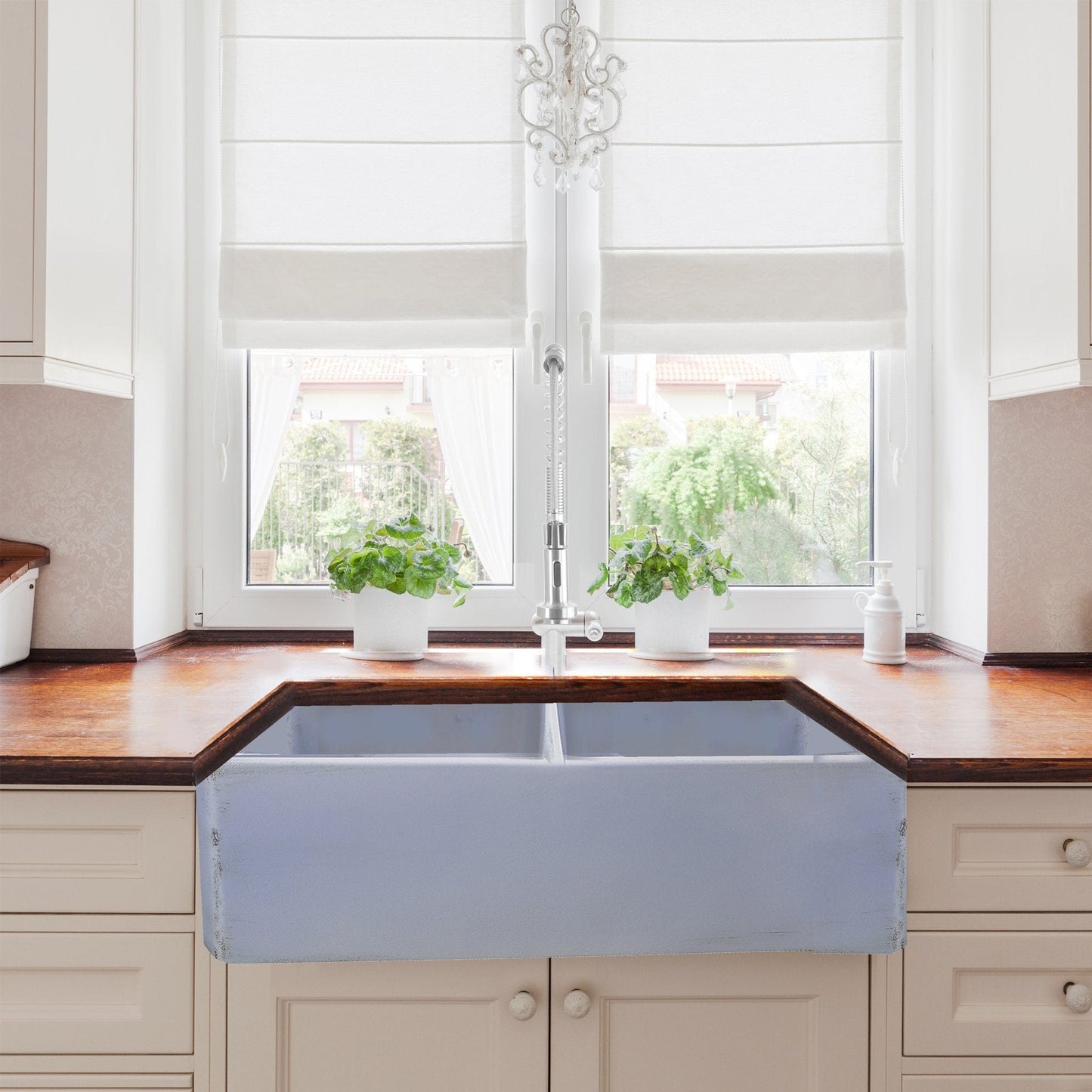 Nantucket 33" Double Bowl Farmhouse Fireclay Sink with Shabby Sugar Finish - FCFS3318D-ShabbySugar in a modern kitchen.