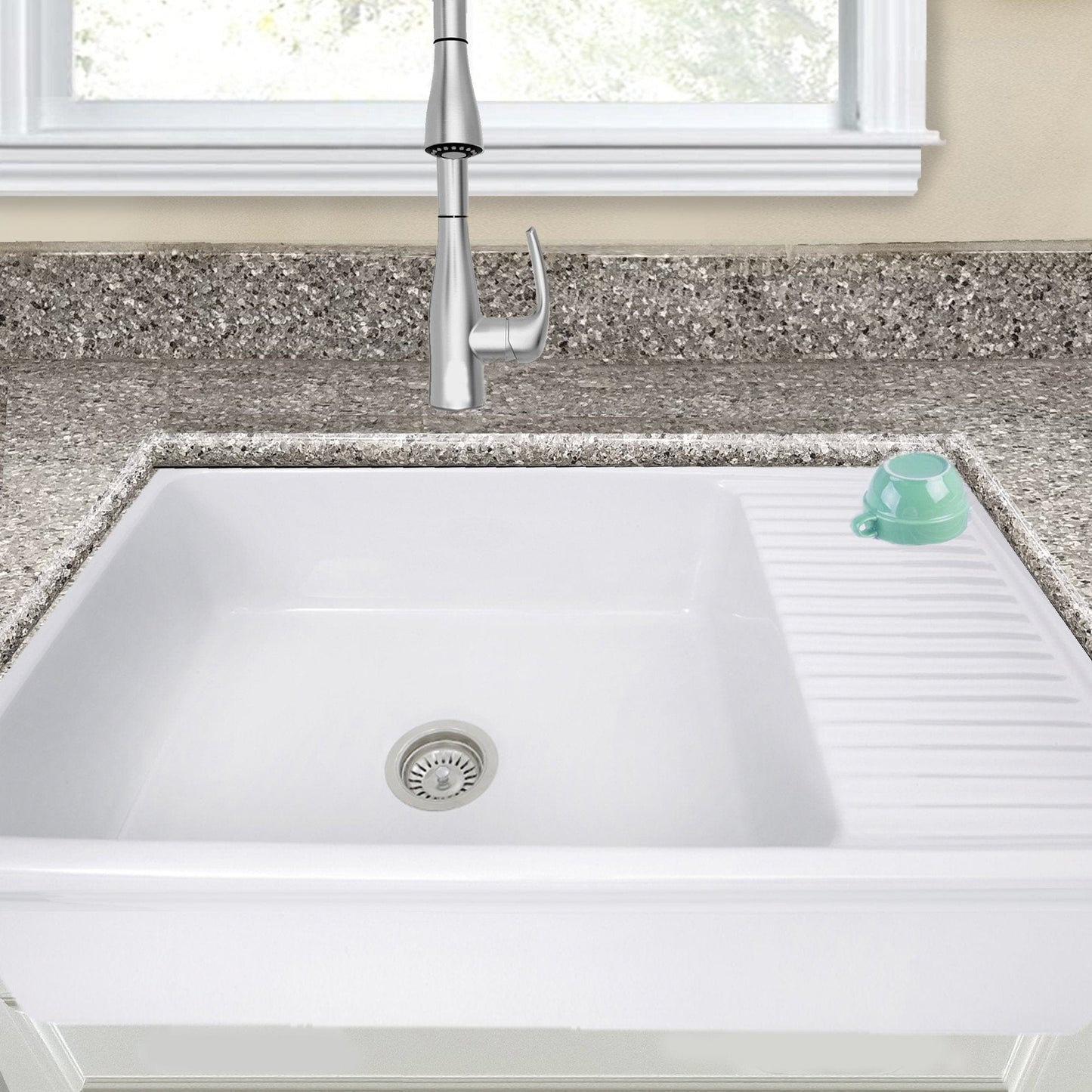 Nantucket 36" Italian Farmhouse Fireclay Sink with Built-In Drainboard - FCFS36-DB on a granite countertop.