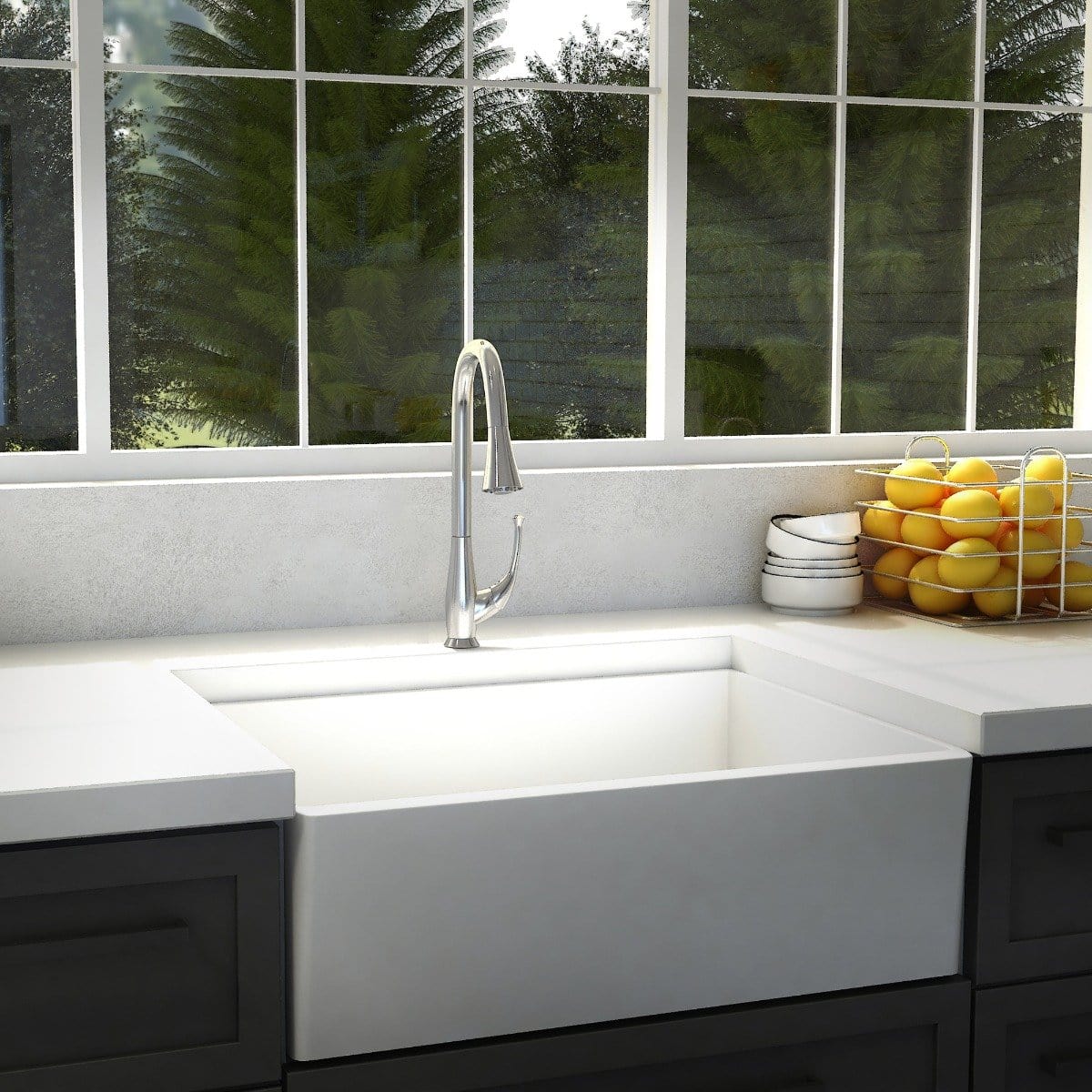 ZLINE Castor Chrome Kitchen Faucet CAS-KF-CH installed above a white farmhouse sink with fresh lemons nearby.