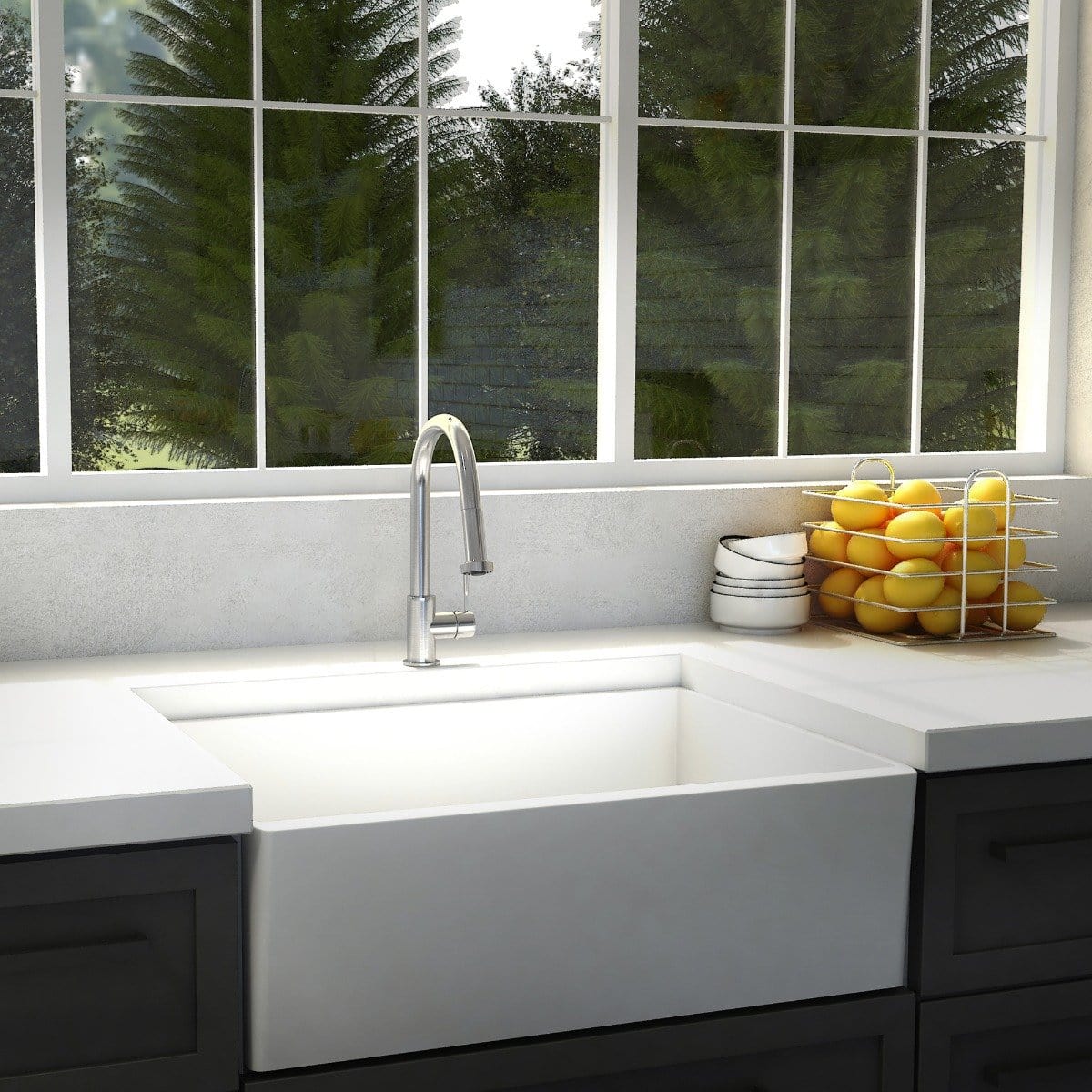 ZLINE Monet Kitchen Faucet installed in a stylish kitchen sink with fresh lemons on the counter.