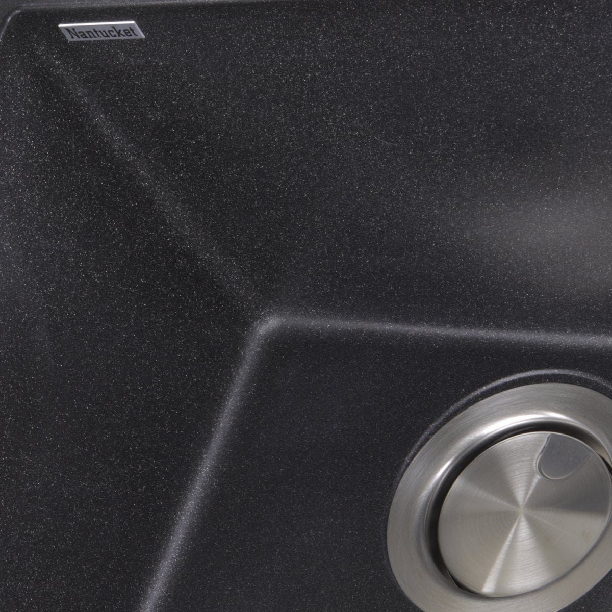 Striking Black Bar Sink - Nantucket 17" Undermount for Bold Entertaining - close-up of the interior finish and drain.