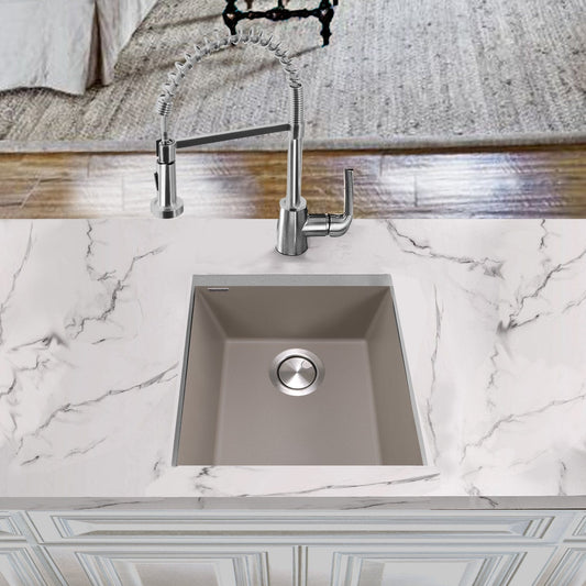 Truffle Bar-Prep Sink - Nantucket 17" Undermount for Entertaining on a marble countertop with modern faucet.