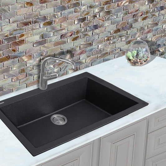 Nantucket 33" Dual-Mount Granite Composite Kitchen Sink Black installed with modern faucet on light countertop.