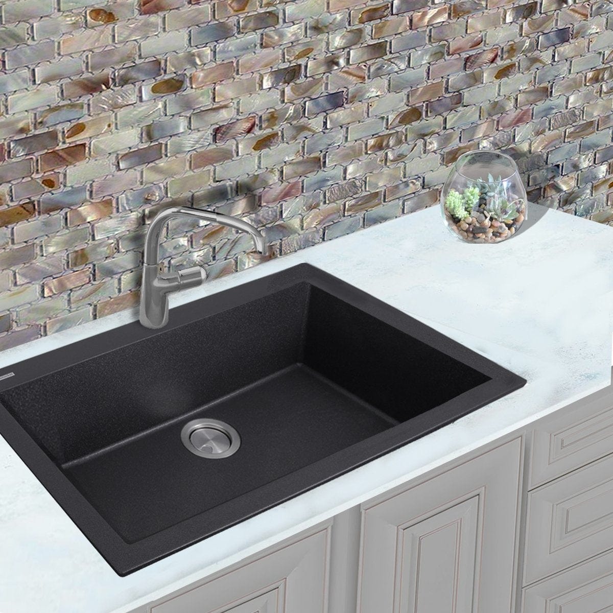 Nantucket Large Single Bowl Dual-Mount Granite Composite Black sink installed in a modern kitchen with a stylish backsplash.