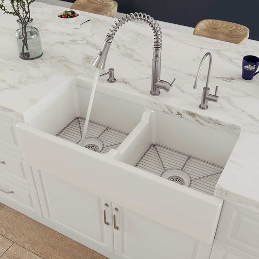 ALFI 39" White Smooth Apron Thick Wall Fireclay Double Bowl Farm Sink AB3918DB-W with modern faucet in kitchen.