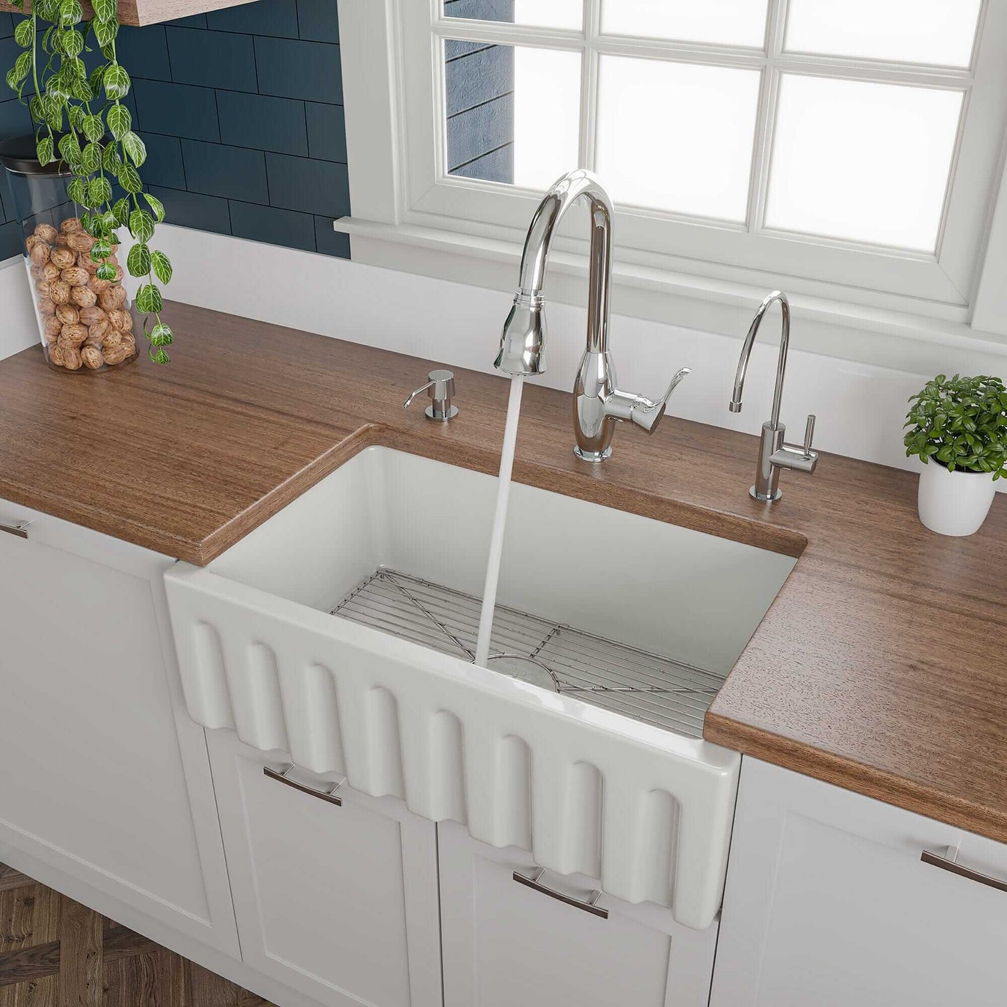 ALFI 30" White Reversible Fireclay Farmhouse Sink installed in a modern kitchen with a wooden countertop.