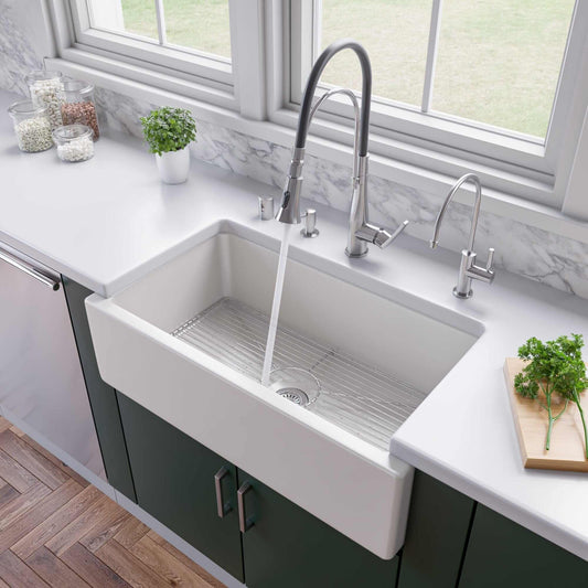 ALFI 33" Reversible Fluted / Smooth Single Bowl Fireclay Farm Sink AB3318HS-W in a modern kitchen setting.